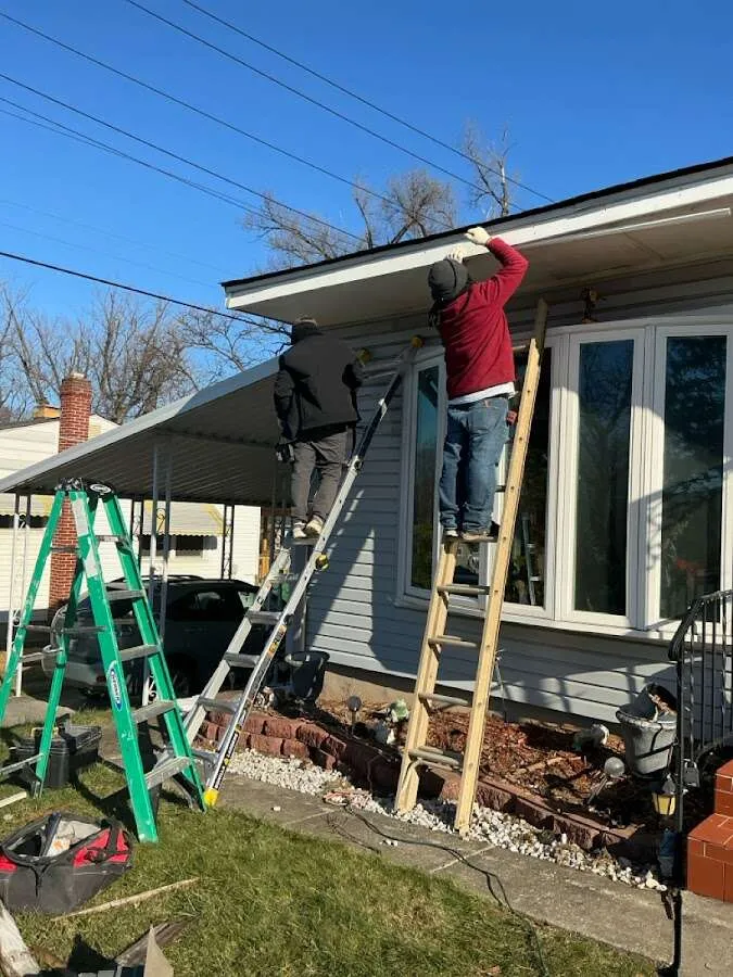 Restoration crew performing exterior repair in Kenai